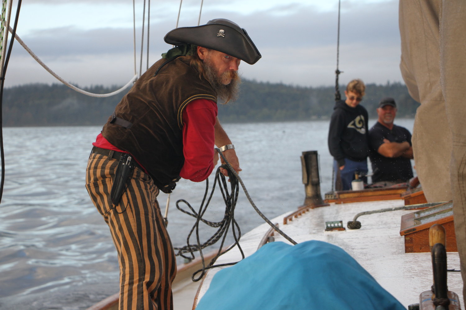 Thomas "Thomas the Pirate" Gregory, manages line aboard the schooner Red Jacket during the Adventuress Cup.